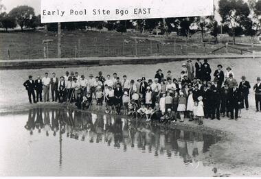 Photograph - VAL CAMPBELL COLLECTION: PHOTOGRAPH OF A LARGE GROUP OF PEOPLE STANDING BESIDE A POOL
