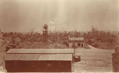 Postcard - ACC LOCK COLLECTION: SEPIA PHOTO OF BATTLEFIELD WITH RAOD AND BUILDINGS, POSTCARD, 1914-1918