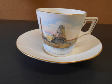 Souvenir - CUP AND SAUCER: HERCULES MINE MOTIF