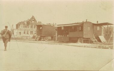 Postcard - ACC LOCK COLLECTION: SEPIA PHOTO OF CARAVANS AND BUILDING, POSTCARD, 1914-1918