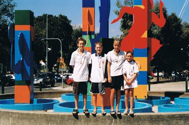 Photograph - VAL CAMPBELL COLLECTION: PHOTOGRAPH OF FOUR CHILDREN STANDING ON A LOW WALL, 2003-2004
