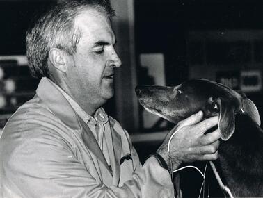 Photograph - BLACK AAND WHITE PHOTOGRAPH OF MAN AND GREYHOUND
