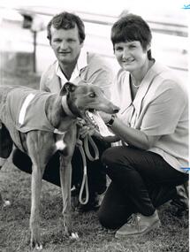 Photograph - BLACK AND WHITE PHOTGRAPH OF OWNERS AND THEIR GREYHOUND