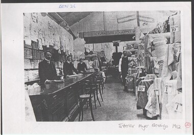 Photograph - photocopy of a B&W photograph of the interior of the Myer Bendigo Store haberdashery section 1912, with four male staff attending