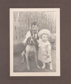 Photograph - B&W photograph of Peter Bray, a young child Harry Gee and a dog, August 2024