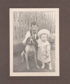 Photograph - Peter Bray, a young child Harry Gee and a dog, McKenzie Family Collection, August 2024