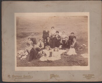 Photograph - Sepia photograph of a family group at a picnic, circa 1910, 4/5/2021