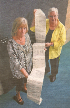 Kay MacGregor and Vivien Newton hold the original petition from the Golden Square residents