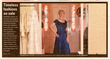 Colour Photo of Christine Howard wearing one of the vintage gowns