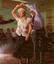Colour Photo of a woman in vintage wear and a man dancing