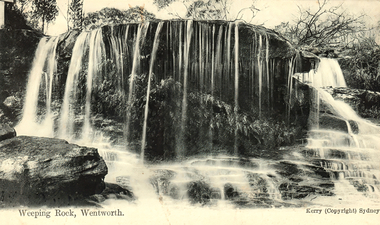 This black-and-white card shows water cascading over a broad rocky ledge; on the card is printed “Weeping Rock, Wentworth.”