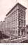 This black-and-white card shows the Commonwealth Bank building with a large crowd and procession in the surrounding streets; on the card is printed “COMMONWEALTH BANK OF AUSTRALIA, SYDNEY.”