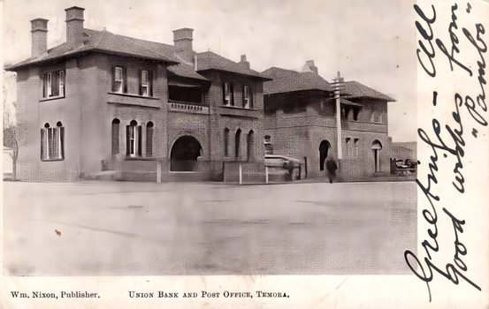 1405.064 This black-and-white card shows the Union Bank and Post Office buildings; on the card is printed “Wm. Nixon, Publisher. UNION BANK AND POST OFFICE, TEMORA.” The hand-writing appears to read ""Greeting - all good wishes from Pamela"