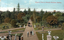 1405.067 This coloured card shows formal garden paths, lawns, flowerbeds and visitors among trees; on the card is printed “General View in Botanic Gardens, Sydney”.