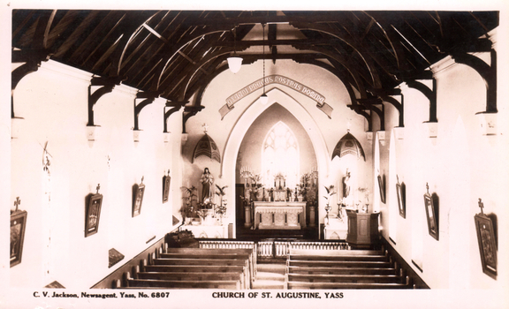 This black-and-white card shows the interior of a church with pews facing an altar; on the card is printed “EXAUDI PRECES NOSTRAS DOMINE”, “C. V. Jackson, Newsagent, Yass, No. 6807” and “CHURCH OF ST. AUGUSTINE, YASS”.