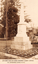 This black-and-white card shows an obelisk monument in a garden; on the card is printed “EXPLORER HAMILTON HUMES MONUMENT ALBURY GARDENS.” and “THE DEPENDABLE SERIES M 5172”.