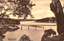 This black-and-white card shows a bridge crossing a broad river framed by trees and rock; on the card is printed “Lane Cove River, Sydney, N.S.W.”