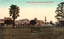 This coloured card shows a garden lawn with trees, a monument and city buildings; on the card is printed “Botanic Gardens, Macquarie Street, Sydney”.