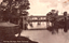 This black-and-white card shows a bridge crossing a calm river; on the card is printed “Murray Bridge, from Corowa.”