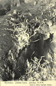 This black-and-white card shows unusual mineral formations inside a cave; on the card is printed “Mysteries. Jubilee Cave. Jenolan. N.S.W.” and “Series 80. Kerry. Copyright. Sydney.”