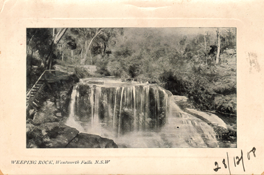 This black-and-white card shows water cascading over a broad rocky ledge in bushland; on the card is printed “WEEPING ROCK, Wentworth Falls, N.S.W”. Hand written on the card is 28/12/08