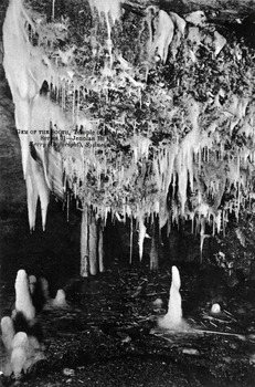 This black-and-white card shows stalactites and mineral formations inside a cave; on the card is printed “GEM OF THE SOUTH, Temple of Baal. Series 31—Jenolan B. Kerry (Copyright), Sydney.”