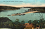 This coloured card shows an elevated view of a harbour, sand spit, wharves and small boats; on the card is printed “1715 - The Spit, Middle Harbour, Sydney.”