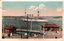 1405.156 This coloured card shows a warship in Sydney Harbour beside waterfront buildings; on the card is printed “Fort Macquarie & H. M. S. Powerful, Sydney N.S.W.”