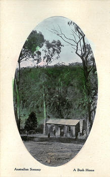 This coloured card shows a small bush cottage in a wooded clearing: On the card is printed “Australian Scenery A Bush Home”.