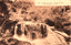 This black-and-white card shows a small waterfall flowing over a broad rock ledge in a wooded setting: On the card is printed “260. The Weeping Rock. — Wentworth Falls. Blue Mountain. N. S. W.”