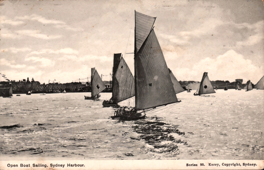 This black-and-white card shows open sailing boats racing on Sydney Harbour: On the card is printed “Open Boat Sailing, Sydney Harbour. Series 95. Kerry, Copyright, Sydney.”