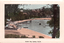 This coloured card shows a sheltered bay with boats, wharves and waterfront buildings; on the card is printed “Double Bay, Sydney, N.S.W.”