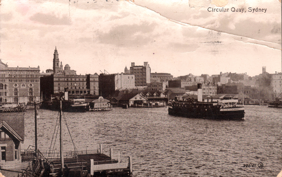 This black-and-white card shows Circular Quay with a ferry and waterfront buildings; on the card is printed “Circular Quay, Sydney” and “300167.”