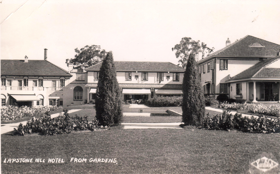 This black-and-white card shows a hotel complex viewed across formal gardens; on the card is printed “LAPSTONE HILL HOTEL FROM GARDENS.”