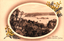 This coloured card shows a harbour and spit viewed from a wooded hillside: On the card is printed “The Spit, Middle Harbour, Sydney”.