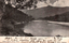 This black-and-white card shows a river winding through a wooded mountain valley: On the card is printed “Biddi Reach, Snowy River. Kerry Photo., Sydney.” The handwriting reads: “Dear Aunt Flo I hope you will like this it is one Charlie got when he was up atCooma. Love from Stella.”