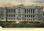 This coloured card shows the Executive Buildings with a statue in the gardens in front: On the card is printed “Executive Buildings, Brisbane, showing Statue of Queen Victoria.”