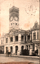 This black-and-white card shows an ornate town hall with a clock tower and a horse-drawn carriage: On the card is printed “Town Hall Toowoomba Queensland”.
