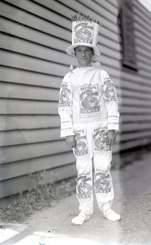 Child in clothing with Kentish Flour bags sewn and hat with wheat on its top