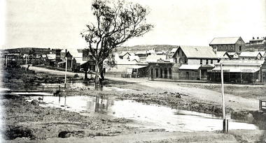 Photo looking along High Street towards Golden Square with the Bendigo Creek on the left.