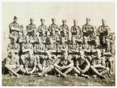 Photo of Robert Reynolds, 3rd from left seated; and 31 other uniformed soldiers of 51st Infrantry at Lilydale Victoria, camp 1914