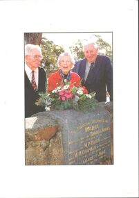 Document - Printed photograph of three people standing behind Ninnes grave