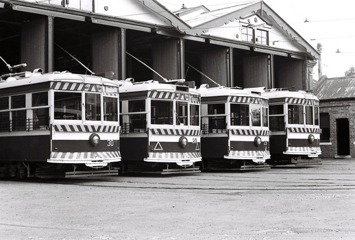11147.2e No 30, 29, 28 and 11 Birney Cars lined up at the Depot