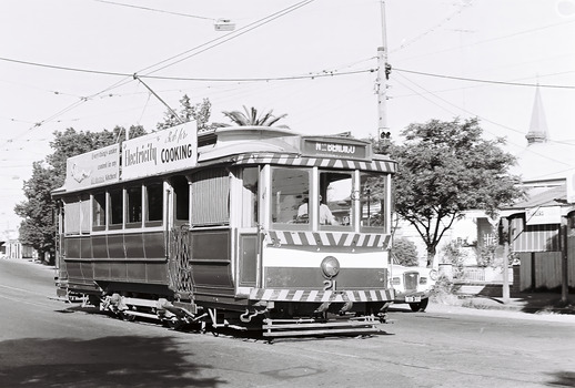 11147.3l No 21 comes into the Golden square Terminus, steeple of the Methodist church in the background