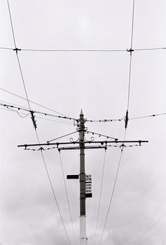 11147.4c Overhead Pole, wires and tram stop sign; and end of section sign