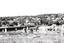 11147.6j The Quarry Hill tram passes the Carpenter and Houston St intersection at the corner of the cemetery