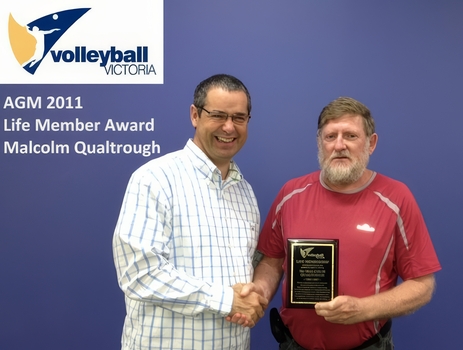 Deputy Leader of the Australian Senate, and President of Volleyball Victoria Inc., Senator Stephen Conroy presenting Life Membership Award to Malcolm Qualtrough, April 2011
