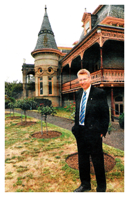 Colour Photo of David French outside the villa