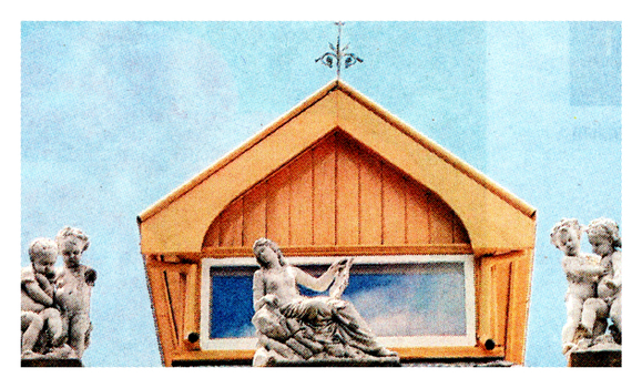 Colour Photo of roof top putti.