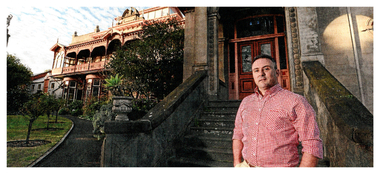 Colour photo of Fortuna Villa with the owner Paul Banks